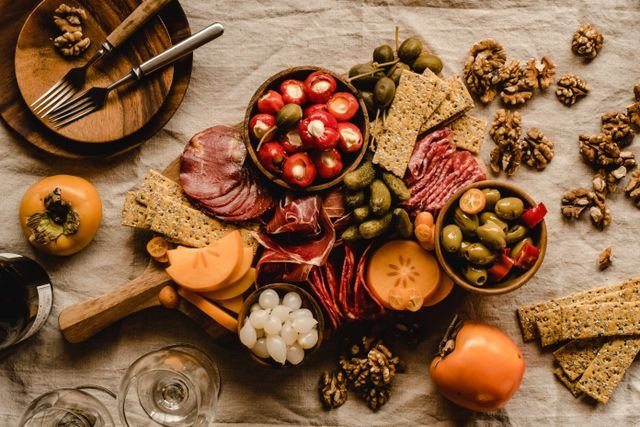 Rustic Charcuterie Board with Walnuts and Olives