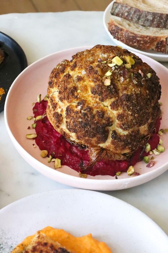 Whole Roasted Cauliflower with Beet Hummus